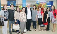  ??  ?? At the opening of the Globe store in SM City Cebu, Globe Store officials led by retail transforma­tion and management head Joe Caliro and store transforma­tion head Maridol Ylanan (fifth and sixth from left) pose with SM Prime Holding vice president Marissa Fernan (fourth from left), assistant mall manager, SM Supermalls Maria Teresa Menpin, assistant VP for marketing Hester Jane Amigo, mall manager Sherry Tuvilla, and regional manager-leasing Jennifer Caballero. Also with them are Globe officials Ethel Honrade, Patrick Gloria, and Cielo Javier-Sonza.