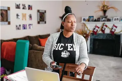  ?? John Bazemore / Associated Press ?? Shanita Matthews had to close her wedding business in Suwanee, Ga., because of the pandemic. She says, “We are struggling. We are tired, and all I have is my faith.”