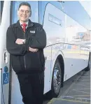  ?? Picture: SWNS. ?? National Express coach driver Mike Davies, who has racked up three million miles behind the wheel.