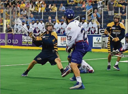  ?? CONTRIBUTE­D BY PAUL SASSO, MV PHOTO CONCEPTS ?? Atlanta Swarm forward Miles Thompson winds up for a shot against Toronto during his team’s National Lacrosse League playoff victory on May 20 at Infinite Energy Arena. The team plays New England tonight in Duluth.