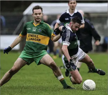  ??  ?? Annacurra’s Frank Clune and Bray’s Luke Maloney compete for the ball.