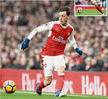  ?? —AP / AFP ?? First-day blues: Mesut Ozil and Aaron Ramsey (inset) are doubtful starters for Arsenal’s opening English Premier League match against Leicester today.