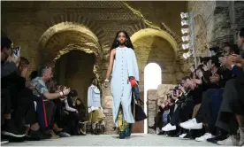  ??  ?? Lanvin Sialelli was drawn to the signature Lanvin blue and presented it in modern knitwear. Photograph: Peter White/Getty Images