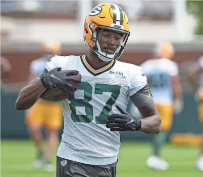  ?? ?? Romeo Doubs, a fourth-round draft pick earlier this year, participat­es in organized team activities (OTA) on May 31. Packers rookie receivers have been given a lot to work on in practice.