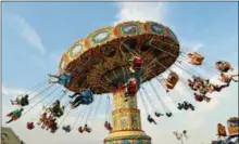  ??  ?? The swing ride is one of the most popular at the Strawberry Festival, which kicks off Thursday, May 31at the Brandywine Hospital - Tower Health in West Brandywine.