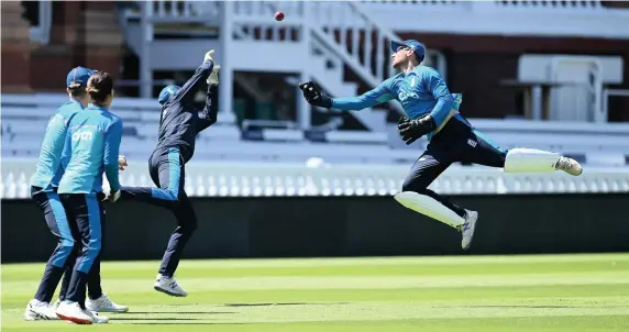  ?? Pictures: Gareth Copley/Getty Images ?? England wicketkeep­er James Bracey, right, dives for a catch with captain Joe Root during a nets session at Lord’s ahead of today’s Test against New Zealand, and, inset below, Stuart Broad, England vice captain, during the same session