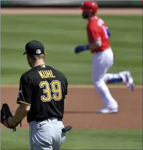  ?? MATT FREED – THE ASSOCIATED PRESS ?? Phillies designated hitter Bryce Harper rounds the bases after hitting a home run off Pittsburgh Pirates pitcher Chad Kuhl in the first inning of a spring training game on March 5. Harper won’t have the chance to DH this season, but he promises to help provide the Phillies every chance of success.