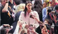  ?? PHOTO: BRAD PENNERUSA TODAY SPORTS ?? Centre of attention . . . College star Caitlin Clark went first in the WNBA Draft in Brooklyn yesterday to the Indiana Fever.