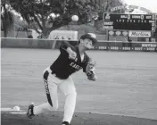  ?? BILL DALEY Special to the Miami Herald ?? Douglas starting pitcher and UF commit Jake Clemente fires a pitch during the Eagles’ 3-2 win over Taravella on Friday in a Region 4-7A baseball semifinal.