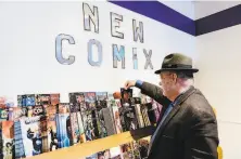  ??  ?? Robert Steele of San Francisco shops at Comix Experience on Divisadero Street.