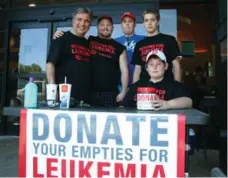  ?? TROY BRIDGEMAN/GUELPH MERCURY FILE PHOTO ?? Guelph MP Frank Valeriote, left, joins others raising money for leukemia research in 2010. The Beer Store donates $1.7 million a year to the Leukemia & Lymphoma Society, largely through its bottle drive.