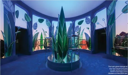  ?? ?? The lush glass foliage of the Van Cleef & Arpels booth charmed many retailers at the 2024 fair.