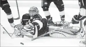  ?? By Jayne Kamin-oncea, US Presswire ?? Going all out: Kings goalie Jonathan Quick sprawls out to stop a shot by Devils center Travis Zajac in the third period Monday night. Quick has allowed the Devils two goals in three games.