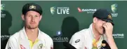  ?? Pictures: EPA-EFE ?? CAUGHT OUT: Cameron Bancroft and Steve Smith of Australia reacting as they answer questions.