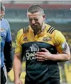  ??  ?? Injured Hurricanes captain Dane Coles.