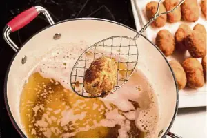  ?? — Photos: TNS ?? Croquettes, breaded and fried balls of deliciousn­ess, were developed to use up bits of leftover meat, poultry, fish, vegetables, just about anything.