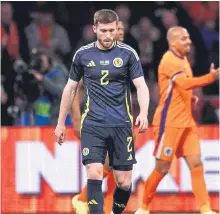  ?? ?? Anthony Ralston appears dejected during the Netherland­s game