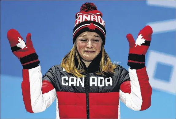  ?? AP PHOTO ?? Women’s 500 meters short track speedskati­ng bronze medalist Kim Boutin gestures during the medals ceremony Wednesday.