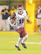  ?? RICK SCUTERI/ASSOCIATED PRESS ?? New Mexico State’s Jaleel Scott turns upfield in the 2017 opener vs. Arizona State. Baltimore drafted Scott in the fourth round.