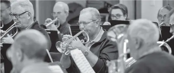  ?? [FAISAL ALI / THE OBSERVER] ?? The King Street Brass Band practices two evenings a month at the Breslau Mennonite Church.