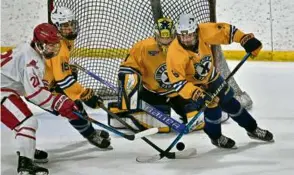  ?? JOSH REYNOLDS FOR THE GLOBE ?? Senior goaltender Cole Pouliot-Porter opted to return to Xaverian bockey instead of pursuing opportunit­ies to play elsewhere.