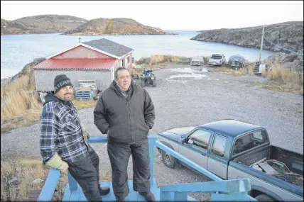  ?? KyLe GreeNhAM / The NorTherN PeN ?? Howard Russell and his son Bill are enjoying their last moments at the family home. Howard has already begun reworking the home so he can return to William’s Harbour every summer.