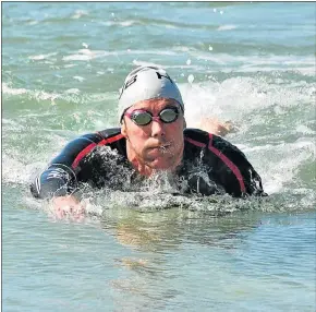  ?? Picture: IVOR MARKMAN ?? LONG JOURNEY: Kyle Main will be swimming from the Port of Ngqura to the Port of Port Elizabeth tomorrow