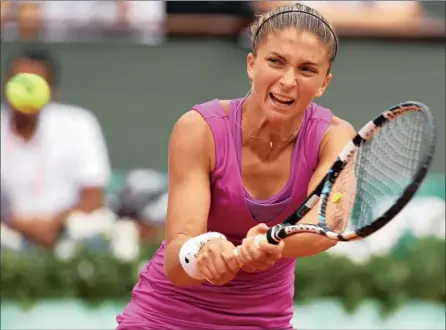  ??  ?? NIMBLE: Italy’s Sara Errani plays a backhand during her 7-5 1-6 6-3 semi-final win over Australia’s Samantha Stosur at Roland Garros in Paris yesterday.