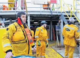  ?? Jennifer A. Dlouhy / Houston Chronicle ?? Pete Slaiby, a vice president of Shell Alaska, surveys the scene on the Noble Discoverer last month. He is overseeing the company’s Arctic exploratio­n.