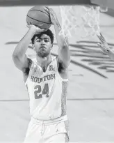  ?? Brett Coomer / Staff photograph­er ?? UH’s Quentin Grimes has the shooting touch an executive like the 76ers’ Daryl Morey covets.