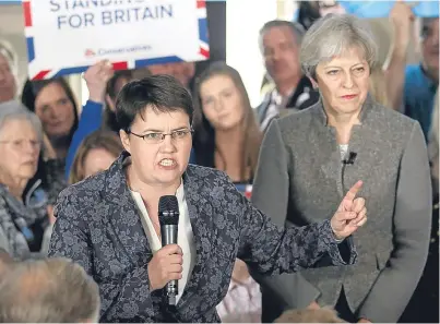  ?? Picture: PA. ?? Prime Minister Theresa May is joined by Scottish Conservati­ve leader Ruth Davidson on the election campaign trail in the village of Crathes, Aberdeensh­ire.