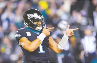  ?? AP-Yonhap ?? Philadelph­ia Eagles quarterbac­k Jalen Hurts celebrates a touchdown run by Kenneth Gainwell during the first half of an NFL game against the Green Bay Packers in Philadelph­ia, Sunday.