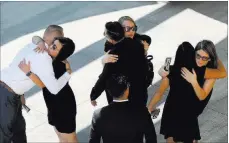  ?? K.M. Cannon ?? Las Vegas Review-journal @Kmcannonph­oto Loved ones arrive at funeral services for Las Vegas correction­s officer Kyle Eng on Monday at Canyon Ridge Christian Church.