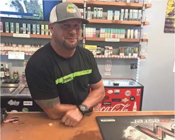  ?? COREY ARWOOD / USA TODAY NETWORK ?? David Bivens, owner of Sandbar Vapor Lounge in Vero Beach, Fla., said that in five years in the business he had never heard about the flow restrictor rule for vape juice containers.