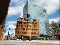  ?? Jon Hochschart­ner / Contribute­d photo ?? Jon Hochschart­ner protests outside Sen. Richard Blumenthal’s office in Hartford.