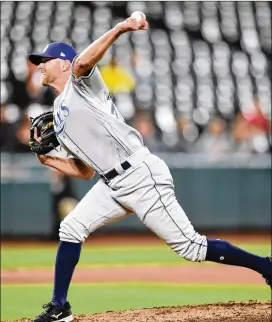  ?? MITCHELL LAYTON / GETTY IMAGES ?? Jonny Venters was brought up by the Rays on April 25 at Baltimore and recorded an out in his first major league appearance in more than 2,000 days.