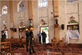  ?? Photograph: Athit Perawongme­tha/Reuters ?? A view of the damage at St Sebastian’s church in Negombo.