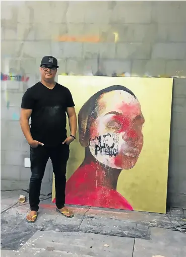  ?? /Mary Corrigall ?? Work of heart: Dion Cupido creates his large canvas portraits in his Kensington studio. The self-trained artist, who famously sold a painting to Beyonce, says he makes art that will hopefully sell.