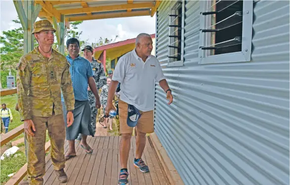  ?? Photo: DEPTFO News ?? Prime Minister Voreqe Bainimaram­a checks out the new Galoa Primary School in Vanua Levu built by the Republic of Fiji Military Forces and the Army engineers from the Australian Defence Force.