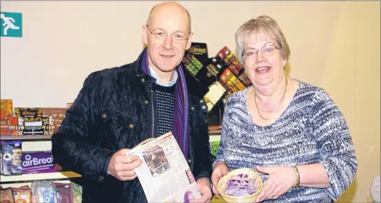  ?? Picture: David Phillips. ?? John Swinney MSP with Anna Bowman, coordinato­r of a Fairtrade Fortnight coffee morning in Blairgowri­e Town Hall. The event realised £277 which will be sent to Traidcraft Exchange. On behalf of the organisers, Anna thanked all who helped.