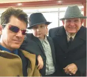  ?? FRANK PAUL ?? Frank Paul, from left, Jackson Paul and Richard Moseley pose for a photo during one of Paul’s shows several years ago. Mosely and the Pauls have been friends for years after meeting at the old Rock ’n Roll Mc’Donalds in Olympia Fields.