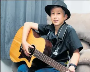  ?? Photo / Supplied ?? Te Awamutu 11-year-old Sean Lurman earns up to $100 an hour busking, most of which goes into purchasing musical equipment.