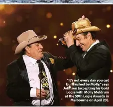  ??  ?? “It’s not every day you get bumrushed by Molly,” says Johnson (accepting his Gold Logie with Molly Meldrum at the 59th Logie Awards in Melbourne on April 23).