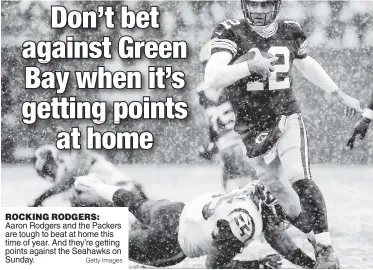  ?? Getty Images ?? ROCKING RODGERS: Aaron Rodgers and the Packers are tough to beat at home this time of year. And they’re getting points against the Seahawks on Sunday.