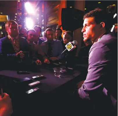  ?? AP PHOTO/BUTCH DILL ?? Florida quarterbac­k Feleipe Franks, right, speaks during the SEC Media Days on Monday in Hoover, Ala.