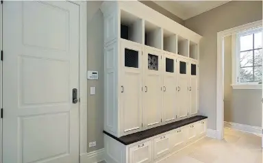  ??  ?? Mudrooms can improve household organizati­on and energy efficiency and even prolong the life of your flooring.