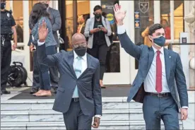  ?? Ap-alex Brandon, File ?? Sen. Raphael Warnock, D-Ga., Sen. Jon Ossoff, D-Ga., wave to the crowd after speaking with President Joe Biden and Vice President Kamala Harris during an event at Emory University March 19.