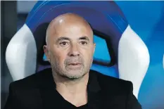  ?? THE ASSOCIATED PRESS ?? Argentina coach Jorge Sampaoli says he begs the team’s 40 million fans for forgivenes­s following a crushing 3-0 loss to Croatia in group stage play on Thursday.