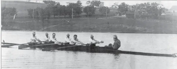  ?? THE ROOMS PROVINCIAL ARCHIVES DIVISION, SANL 1.502.036 ?? The 1901 Outer Cove fishermen’s crew establishe­d a course record in the St. John’s Regatta by stopping the clock in 9:13 3/4, a time that would stand for 80 years. Pictured (from left) are Martin Boland, John Nugent, Denis Croke, Denis Mccarthy, Daniel Mccarthy, stroke John Whelan and cox Walter Power. This photo, according to Frank Graham’s “Ready ... Set ... Go, A St. John’s Sports Pictorial,” was taken in 1922 on the afternoon of the evening the Blue Peter was to be taken off the pond and retired. Daniel Mccarthy, apparently, was absent from the photo, working in Boston at the time. A taximan by the name of Bishop was actually sitting in the No. 5 oar’s seat. The intention, according to Graham, who was a sports historian prior to his death, was to later superimpos­e Mccarthy’s likeness over Bishop’s, but that was never done.