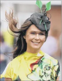  ?? PICTURES: TIM GOODE/MIKE EGERTON/PA/SWNS ?? Top and right, racegoers arrive in windy conditions at Aintree Racecourse ahead of the opening day of the Randox Grand National Festival; left, racegoers watch the action from the opening race and battle against the wind and rain.